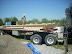 The cured panels are loaded onto a boom truck. These were too tall to tansport upright, but that would have been preferrable