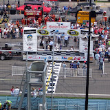 Sitting almost directly behind the flag stand for pre-race ceremonies.