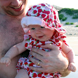 Giggling at the waves at the ocean. (June)