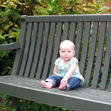 In Williamsburg, VA, sitting on the bench where daddy proposed to mommy. (October)