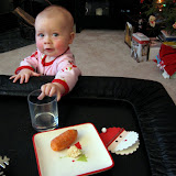 Christmas morning, checking out the plate of goodies we left for Santa. (December)