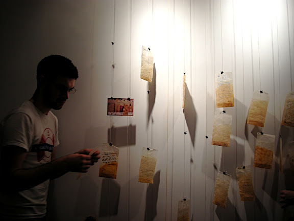 Michele Brodys wall of tea bags @SALT Joe Garrad puts up his tea bag reflection