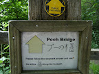 1006120062.JPG Dual language sign to Pooh Bridge