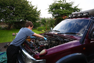 New head fitted with initial torque being applied to bolts
