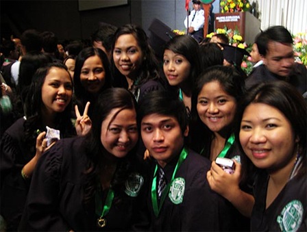 Kenneth with his friends on their graduation.