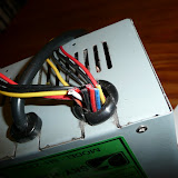This old PSU has sacrificed its wires for the greater good...