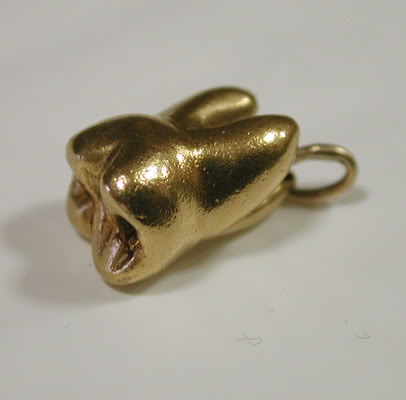 [dente de ouro[5].jpg]