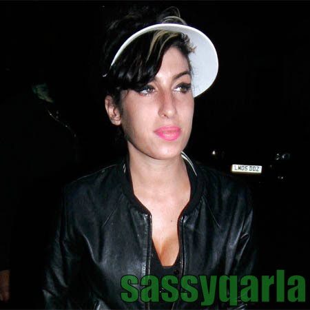 amy winehouse breast bum implants transplant