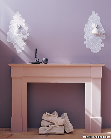 Pretty wallpaper patterns can be cut out to make these easy sconces. (marthastewart.com) Pretty wallpaper patterns can be cut out to make these easy sconces. (marthastewart.com)