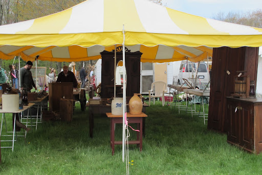 Tents are a necessity to keep antique pieces safe and dry.