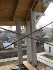 Posts wrapped and installed corbel