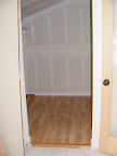 Master closet flooring matches the rest of the room