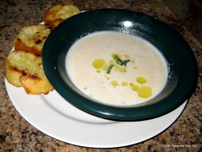 Tuscan White Bean and Garlic Soup with Grilled Baguette Slices - Photo by Taste As You Go