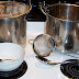 you need two 3 gallon tamale pots with one cover (stainless steel, not aluminum), stainless spoon, two long handled strainers, a medium mixing bowl, a stainless teaspoon. In the dishwasher we have the eight quart mason jars, the lids and the actual strainers I will use. I also like to wash the silicone oven mitts I use.