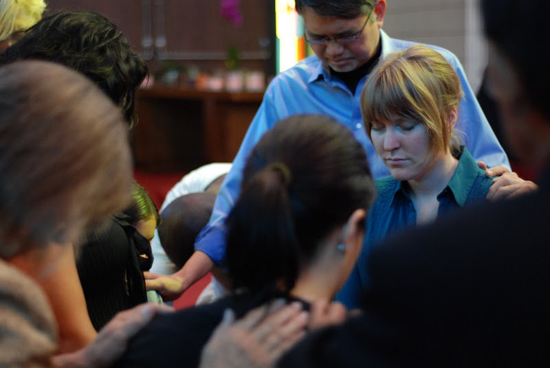 Praying for the new members