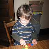 Erik enjoying the math tiles