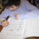 Madeline with her new phonics book
