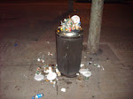 A loaded garbage can after the festivals in Burgos ended.