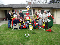 Christmas Day 2006 - 16 — Afternoon at the Mielcasz house, group shot with the carolers: Wes, Sara, Robert, Mike, Beth, Matt, Jody, Lauren, Steve, Lisa, Emily, Mory, Kailtyn, Lester, Patrick