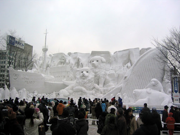 The Antarctic -  I thought this was the best snow sculpture. It features "...the Japanese Antarctic expedition ship Soya on the left and the Sakhalin Huskies Taro and Jiro in the center along with a whale, penguins and seals." http://www.snowfes.com/english/place/oodori/index06-10.html