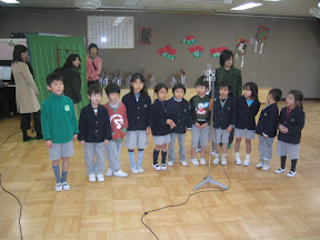 Kai and his Takanawa kindergarten classmates singing the school song. Kai and his Takanawa kindergarten classmates singing the school song.