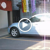 A car being blessed at the Fukagawa Fudoson temple, which specializes in car safety rituals A car being blessed at the Fukagawa Fudoson temple, which specializes in car safety rituals