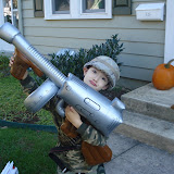 Kai mugging for the camera with his ridiculously large gun
