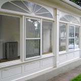 Our sunroom before demolition - a lot of the wood at the base of the walls was rotten