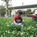 Eidan in the grass at the World City Tower's park