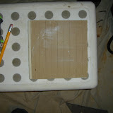 For the sharp curve near the top on each side of the opening, I cut a series of slits on the back of a small piece of 3/8 inch drywall