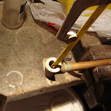 A piece of the shower head pipe was left behind in the wall pipe, so I had to get it out without damaging the threads. I cut about halfway into it in several spots with a hacksaw blade