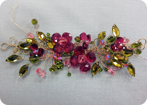 step 6: using the same wrapping techniques as the branches, place the flower on the foundation, starting in the center and wrap wire stem to base.