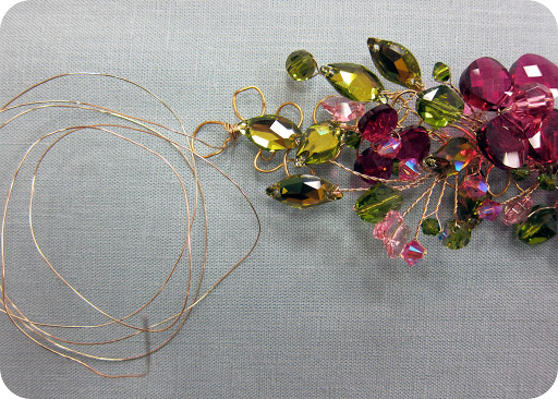 step 8: secure all the elements by wrapping another length of wire around the entire piece.