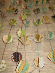 To grace a tree or entranceway—strands of ornaments by Laurie Cinotto of Lalalaurie.
