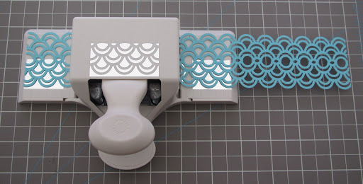 Punch the entire other edge of each strip.