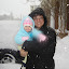 Brother and sister smiling in the snow!