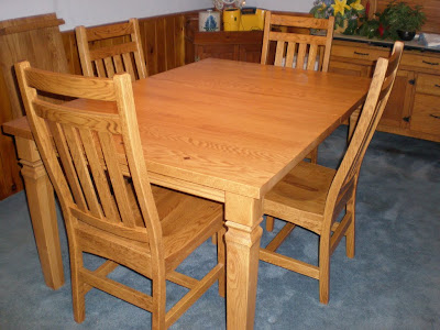 Corsica Dining Table and Trestle Dining Chairs in Honey Oak