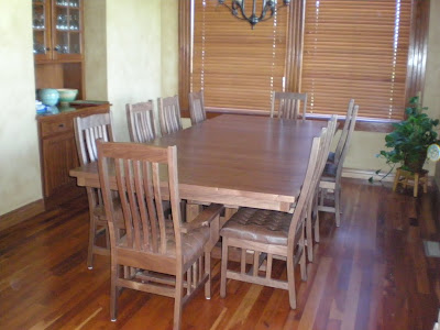 120 x 54 Trestle Table and Raised Mission Dining Chairs in Natural Walnut
