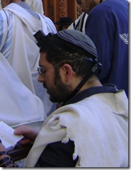 Men Praying At Wall