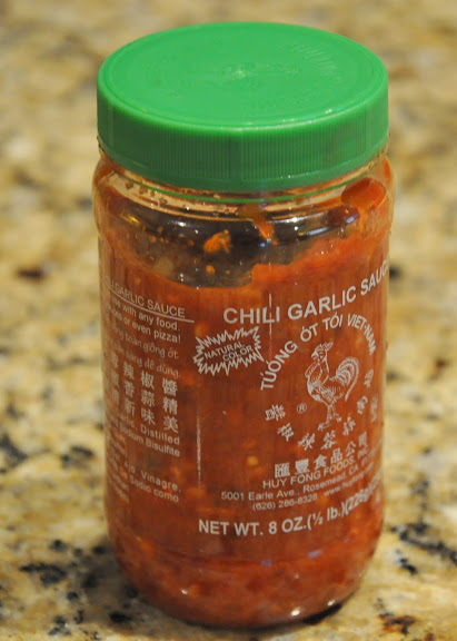 The main ingredient in the marinade is chili garlic sauce, found in the Asian food section of most grocery stores.  A good staple to keep in your fridge.
