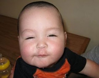 Baby With Funny Face