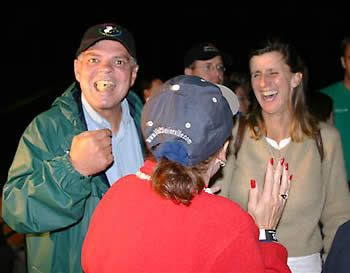 Steve Ownby acting a fool waiting to catch a bus to go up on the hill for dinner at the Jack Daniel's Invitational 2007. (That's Vickie's back.)