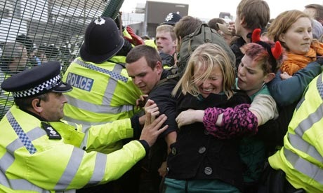 [Police-grapple-with-climate hippies[3].jpg]