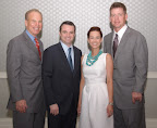 Honorary co-chair Roger Staubach, Brad Berkley, luncheon chairwoman Lindy Berkley and honorary co-chair Troy Aikman.