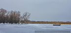 Boat on-Frozen-lake-in-the-Danube-Delta-1.JPG