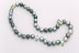 Tahiltian natural pink pearls, with bicolour green tourmalines set in 18ct gold Tahiltian natural pink pearls, with bicolour green tourmalines set in 18ct gold