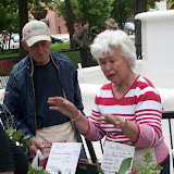 Joyce Gauger of rural Muscatine County explains the best way to plant one of the many perennial flowers she has for sale (KCII NEWS)