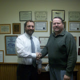 Neal Mills of Ainsworth chose a 42 inch FULL HD TV with DVD home theater system from Archer Appliance and Electronics for his prize.