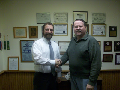 Neal Mills of Ainsworth chose a 42 inch FULL HD TV with DVD home theater system from Archer Appliance and Electronics for his prize.
