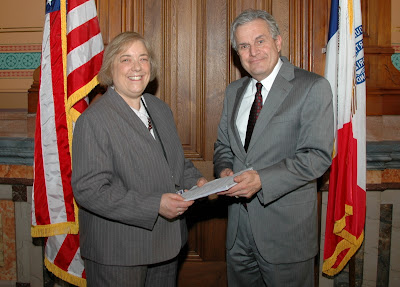 Schmitz filing paperwork with the secretary of state